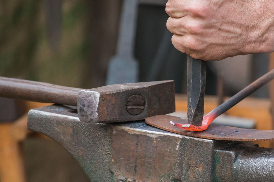 A piece of metal being forged into a crowbar at the Blacktown City Medieval Fayre in New South Wales, Australia.
